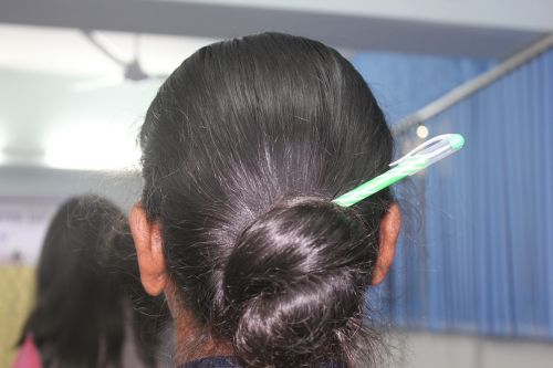 pen hair woman