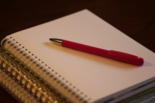 pen paper notebook
