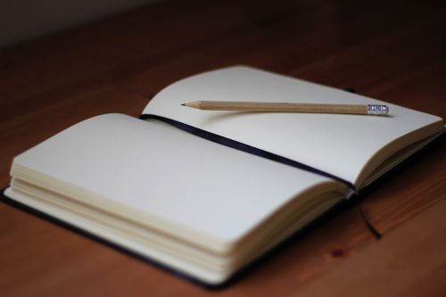 pencil write notebook