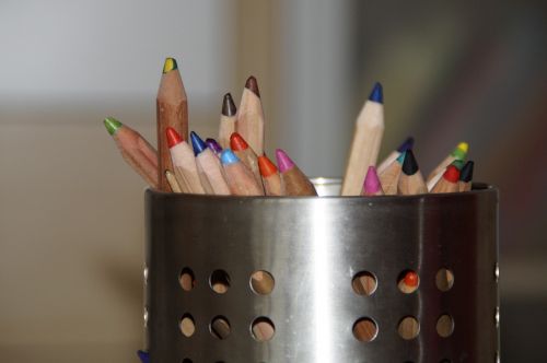pens colored pencils paint