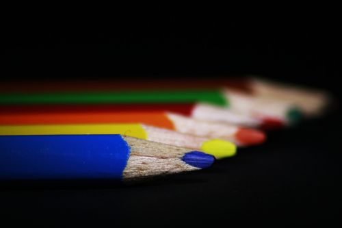 pens colored pencils close