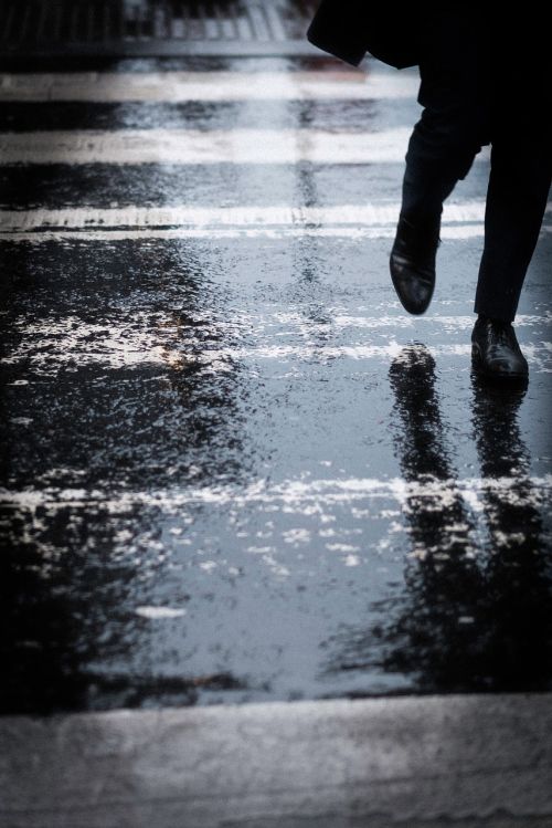 people walking rain