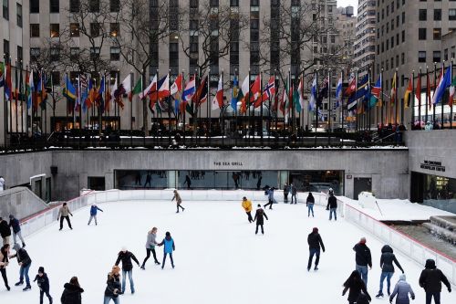 people crowd ice skating