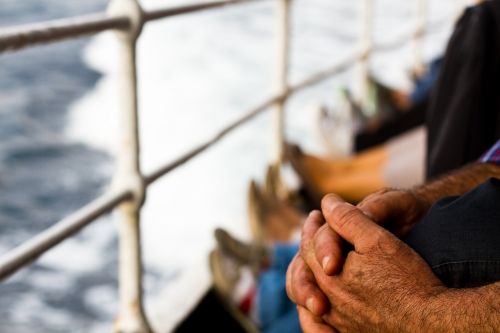 people sitting hand