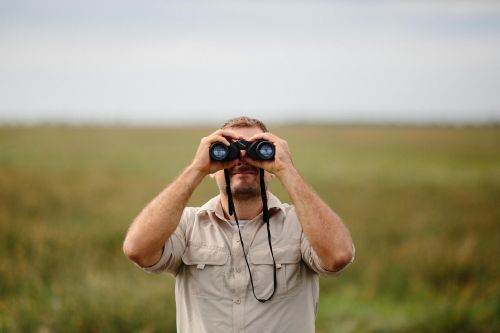 people man binoculars