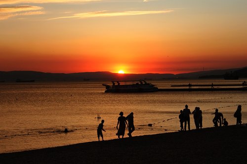 people  sunset  silhouette