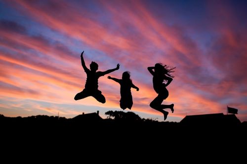 people jumping happiness