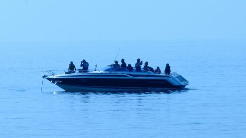 People On A Speedboat