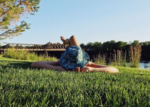 person grass laying