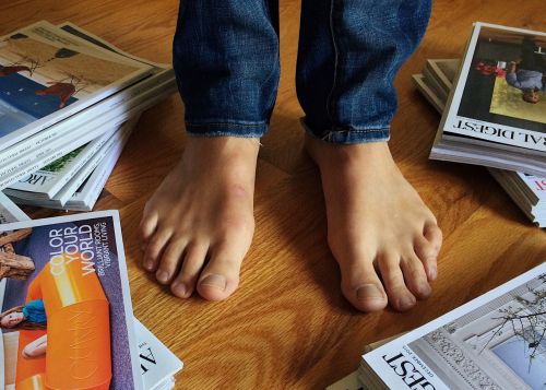 person magazines feet