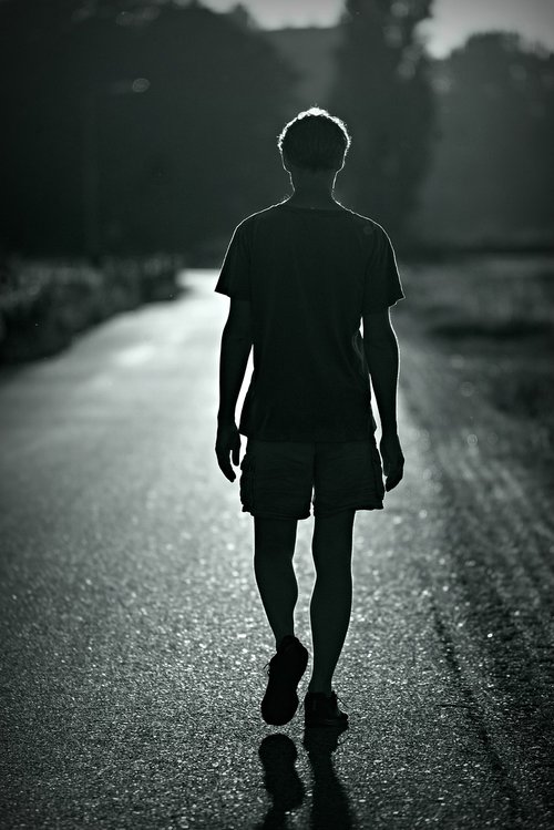 person  walking  silhouette
