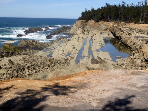 Petrified Sand, Cliffs And The Sea