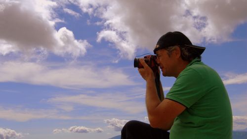 photographer sky clouds