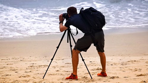 photographer  beach  tripod