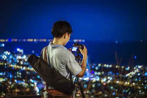 photographer city in night camera