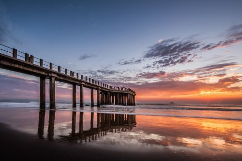 pier sunrise ocean