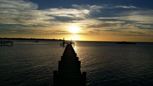 pier sunset clouds