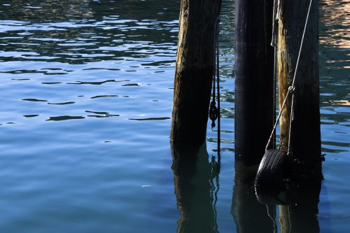 Pier Pilings Blue Water