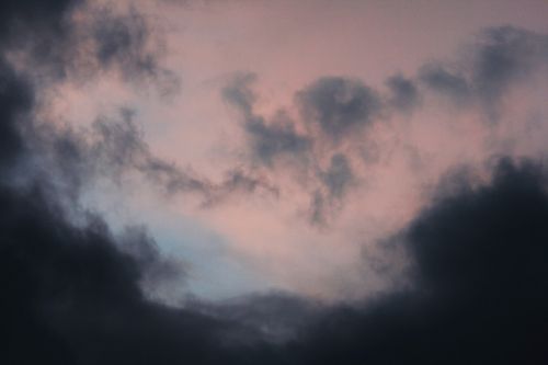 Pink Glow With Black Clouds