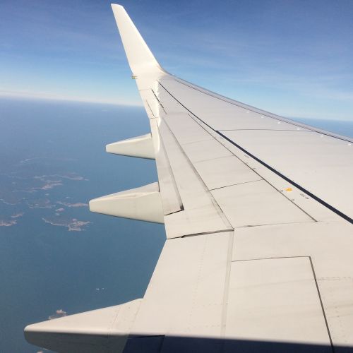 plane wing cloud