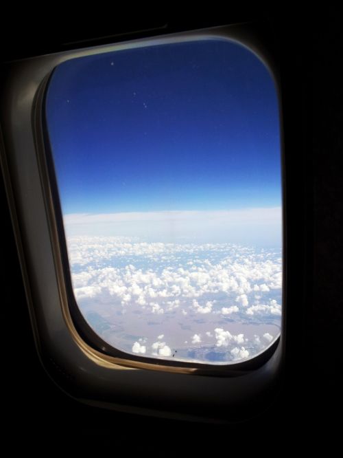 plane window cloud