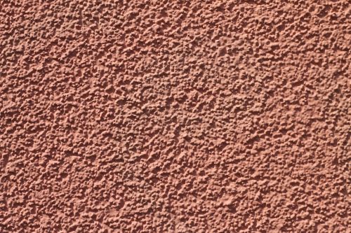 plaster background reddish