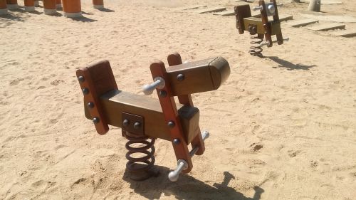 playground horses sand