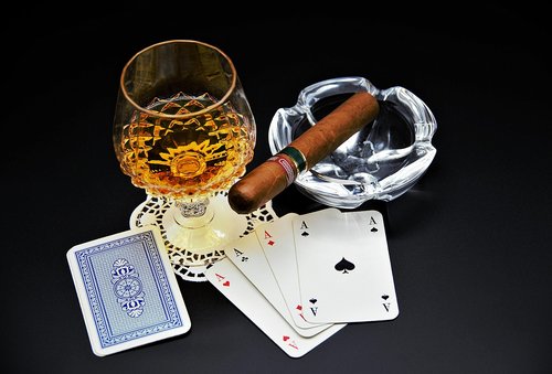 playing cards  cognac  cigar