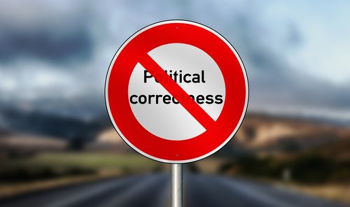 politically  correctly  road sign