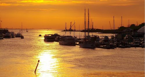 port boats sunset