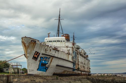 port dilapidated boat abandoned