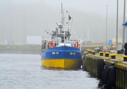 port fishing boat fog
