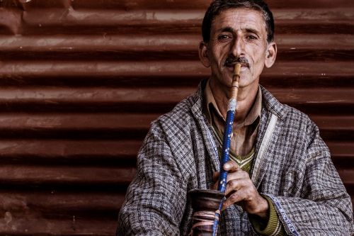 portrait man man smoking hookah