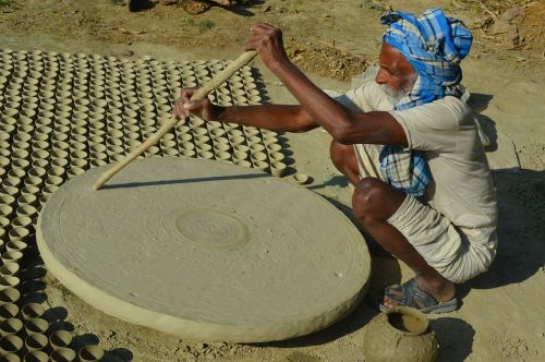 pottery old man working in village