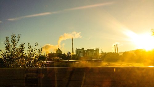 power plant  smoke  sunrise