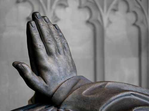 prayer hands effigy