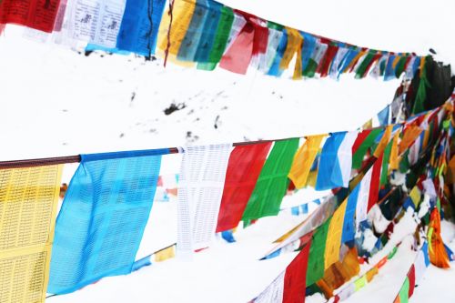 prayer flags tibet in shergyla mountain pass