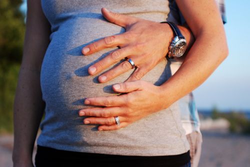 pregnancy hands woman