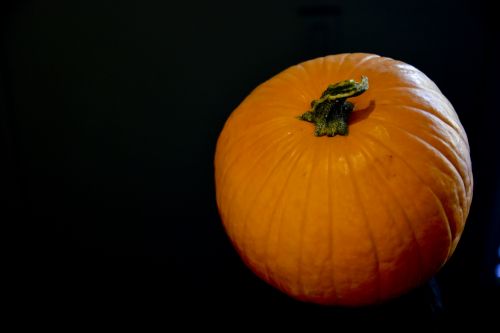 Pumpkin On Black Space