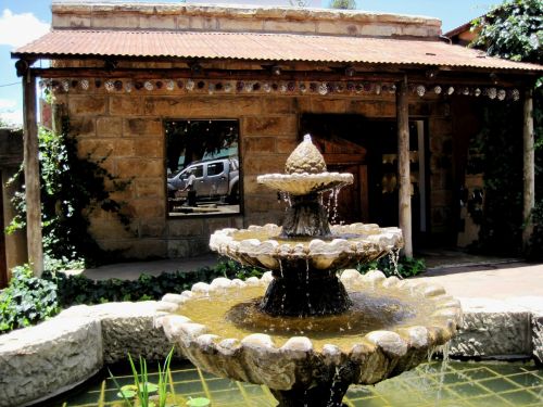 Quaint Shop And Fountain