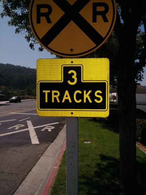 rail track sign post tracks of rails