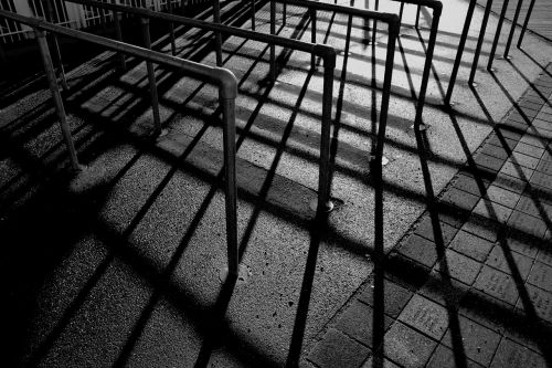 railings shadows black and white