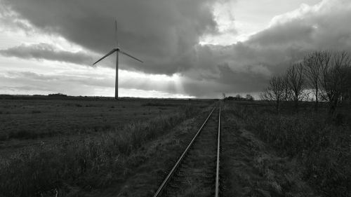 railroad track pinwheel sky