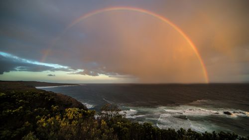 rainbow coast sunset