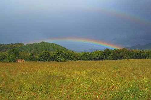 rainbow rain sun