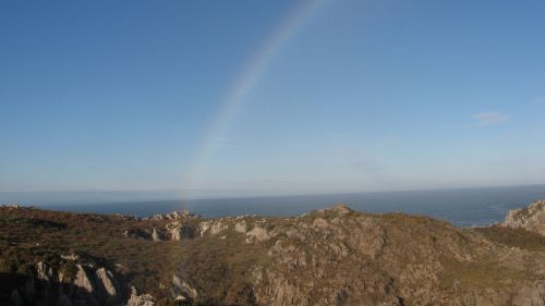 rainbow sea sun