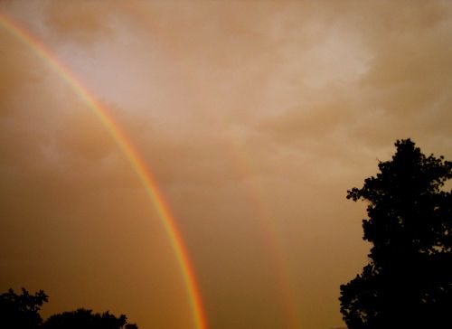 Rainbow In Sunset Sky