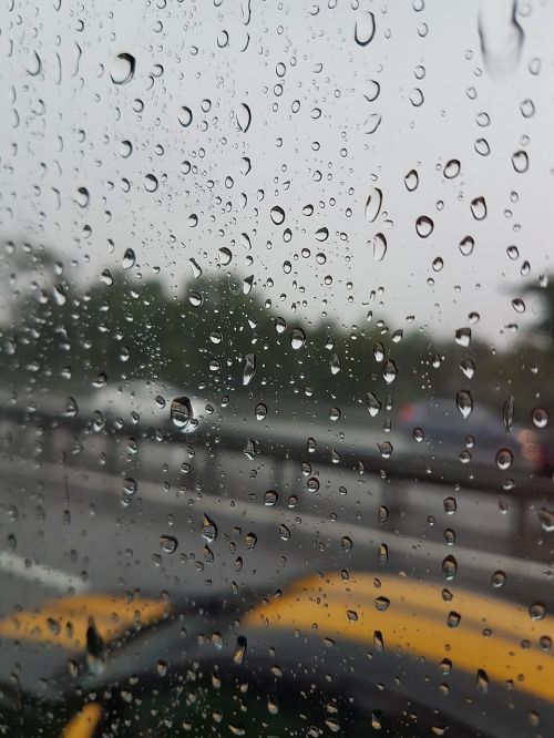 raining road car