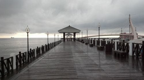 rainy day pier ocean