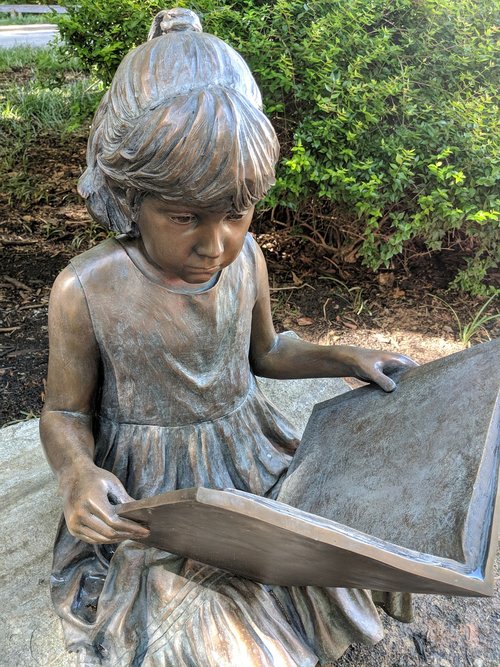 reading  statue  garden
